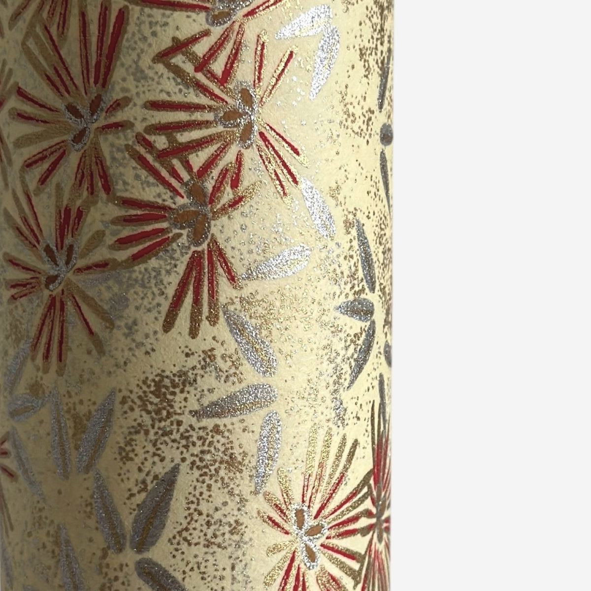 Pattern of scattered pine needles (matsuba) in gold and silver on a cream backdrop. Japanese chiyogami paper