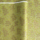 Pattern of scattered pine needles (matsuba) in gold and silver on an olive backdrop.  Japanese chiyogami paper