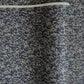 a sheet of Japanese chiyogami yuzen paper with a small abstract pattern in midnight blue on grey