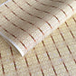 Japanese silkscreen chiyogami paper with a intricate filigree trellis design in brown with gold accent