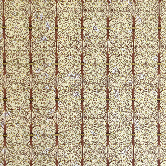 Japanese silkscreen chiyogami paper with a intricate filigree trellis design in brown with gold accent