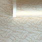 a sheet of Japanese silkscreen printed chiyogami paper with a copper wave design on white ground