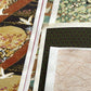 a sheet of Japanese silkscreen printed chiyogami paper with a copper wave design on white ground. Pictured like a mood board layout with other chiyogami designs