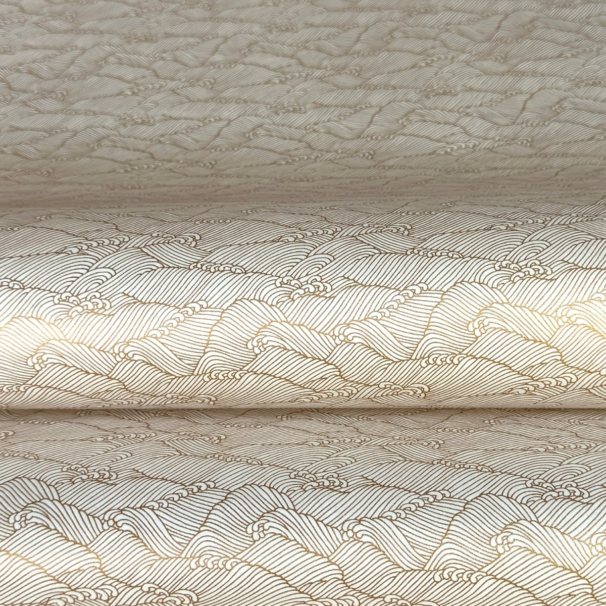 a sheet of Japanese silkscreen printed chiyogami paper with a copper wave design on white ground