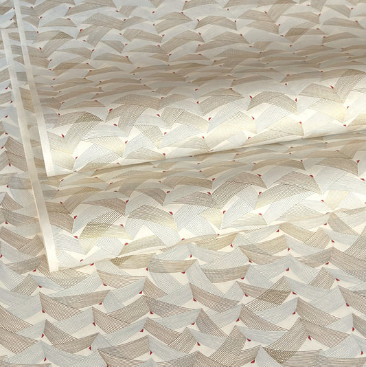 a sheet of Japanese chiyogami paper with gold and silver chevron lines on white paper