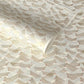 a sheet of Japanese chiyogami paper with gold and silver chevron lines on white paper