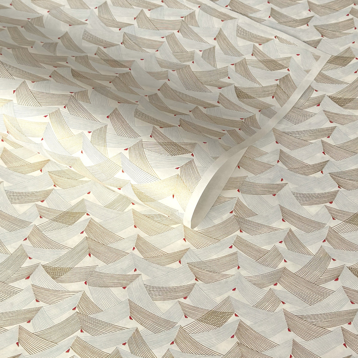 a sheet of Japanese chiyogami paper with gold and silver chevron lines on white paper