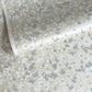 Japanese silkscreen chiyogami paper with a delicate flower design in soft grey on an ivory pearlescent backdrop