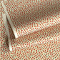 japanese silk-screen handmade paper, chiyogami, with red and aqua plum flowers repeat pattern
