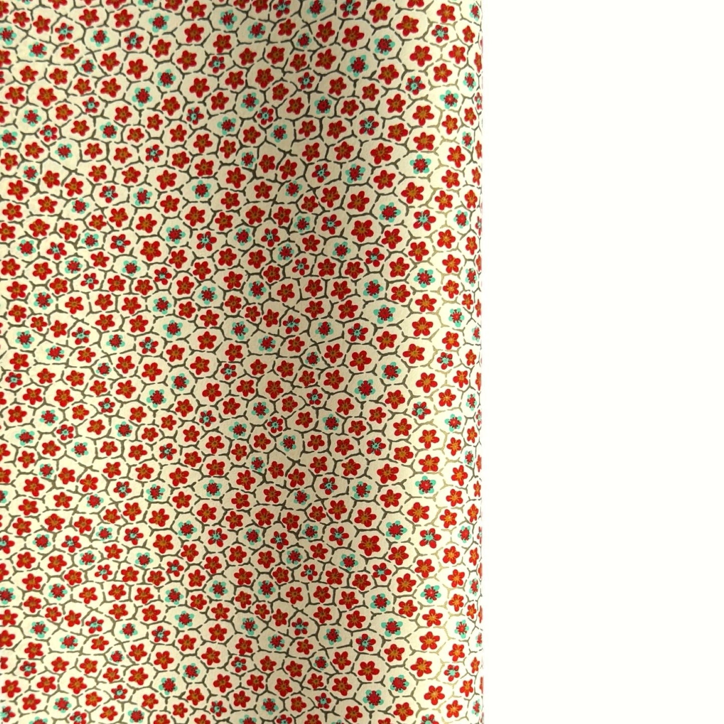 japanese silk-screen handmade paper, chiyogami, with red and aqua plum flowers repeat pattern