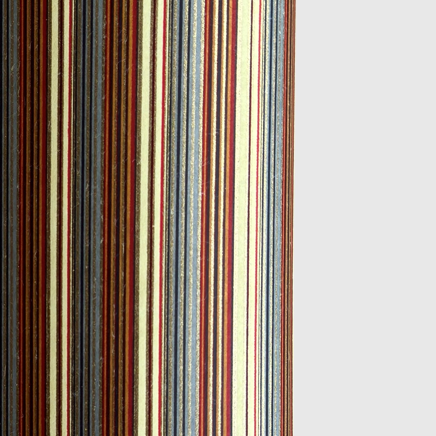 Japanese silkscreen chiyogami paper with a classic narrow stripe pattern in earthy tones of brown, grey, cream, black and gold.