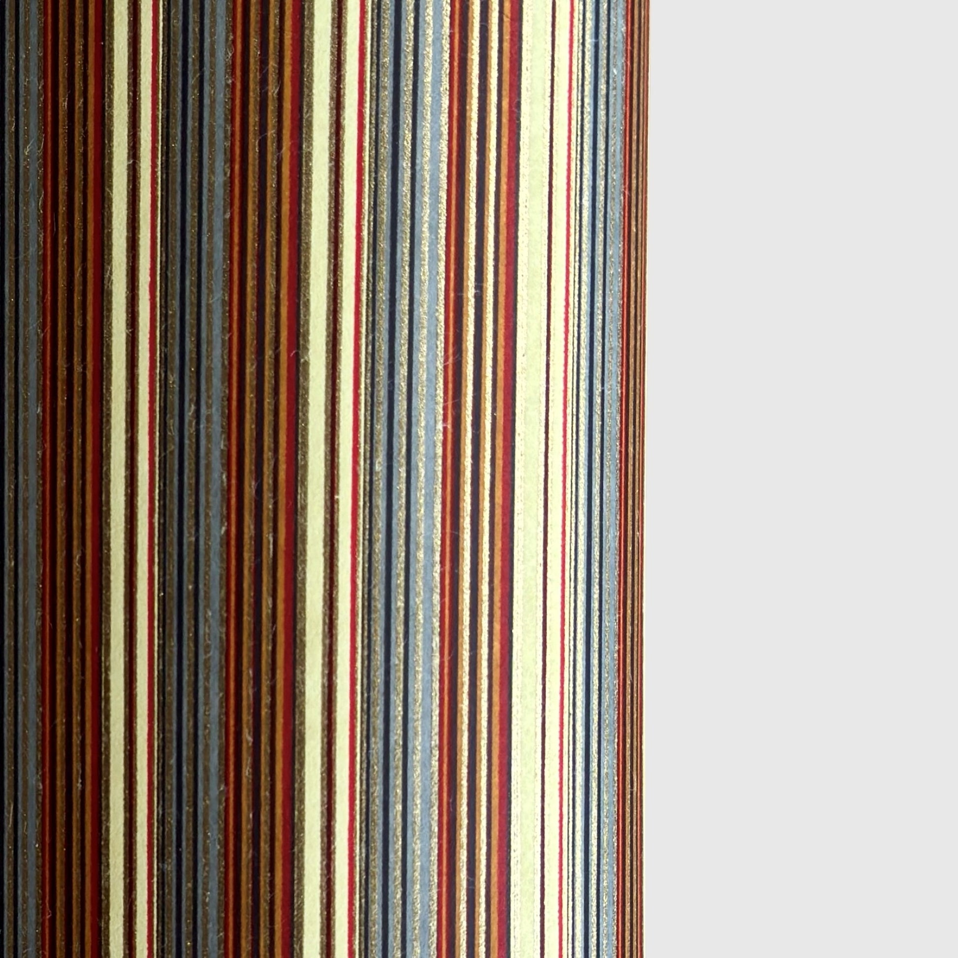 Japanese silkscreen chiyogami paper with a classic narrow stripe pattern in earthy tones of brown, grey, cream, black and gold.
