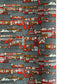 Japanese chiyogami paper (silkscreen printed) with a city landscape in grey, red and orange.