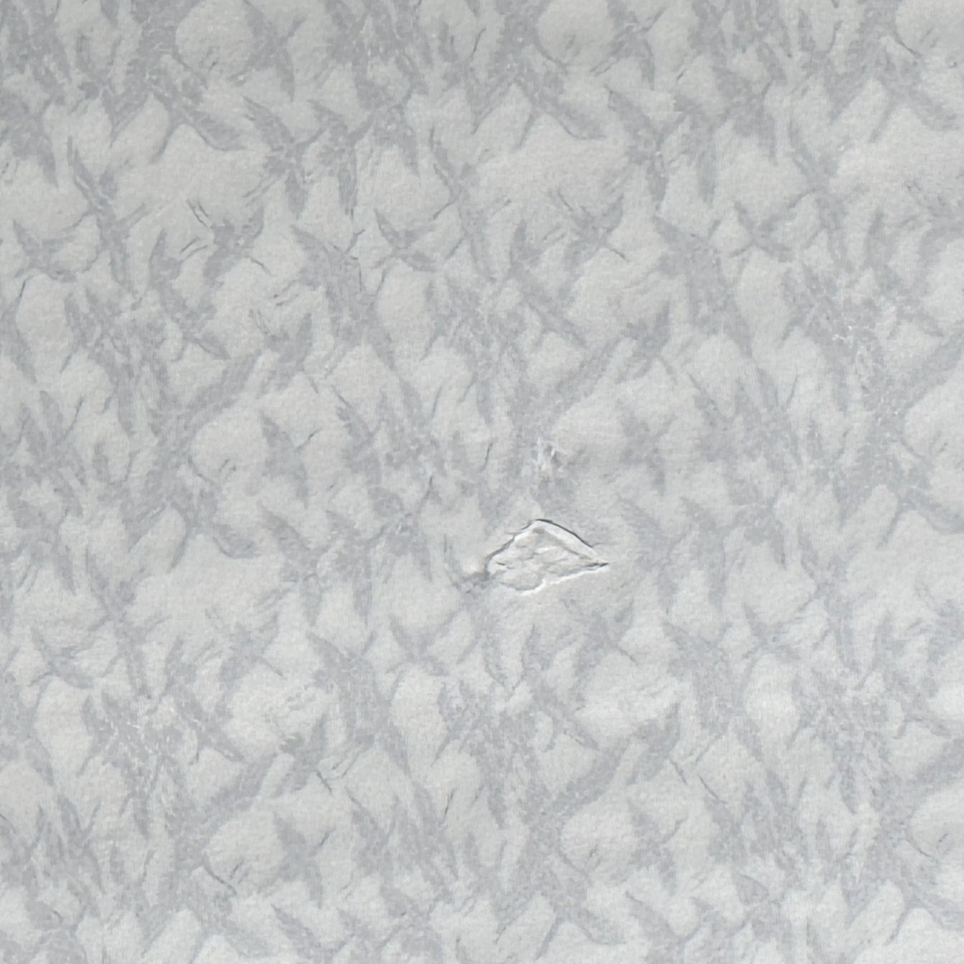 japanese silk-screen handmade paper showing gold cranes in flight on ivory backdrop, reverse of paper showing a small damage to the paper