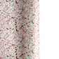 Japanese chiyogami paper with pale pink plum blossom, dark brown branches on an ivory background.