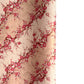 Diagonal branches of pink plum (ume) blossom on a light pink background with gold accents. Japanese chiyogami paper
