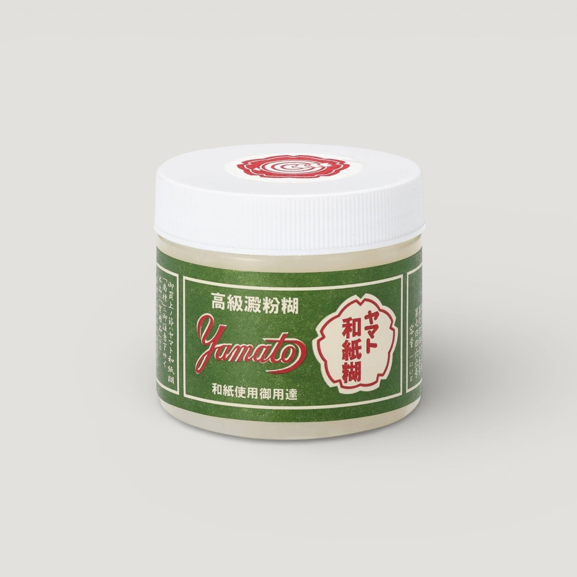 Yamato Japanese premium paste glue 100g.  Image shows the plastic pot with a Yamato vintage label