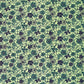 a sheet of katazome paper with a floral design in shades of green and indigo blue.