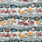A colourful traditional pattern depicting stylised waves (seigaiha) with flowers and foliage in green, yellow, red and blue. A sheet of Japanese katazome paper.