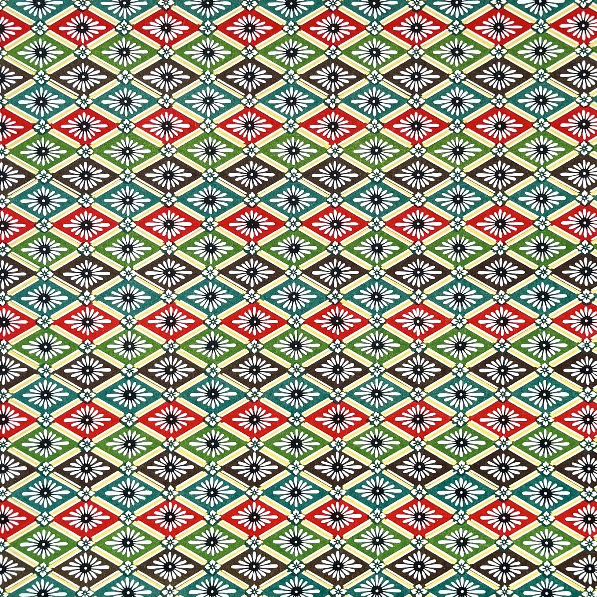 A sheet of katazome paper with a repeat rhombus pattern with the Japanese motif of the water caltrop plant (hishi) depicted alongside the four-petal flower of the water chestnut (hanabishi) in red, green. brown and teal.