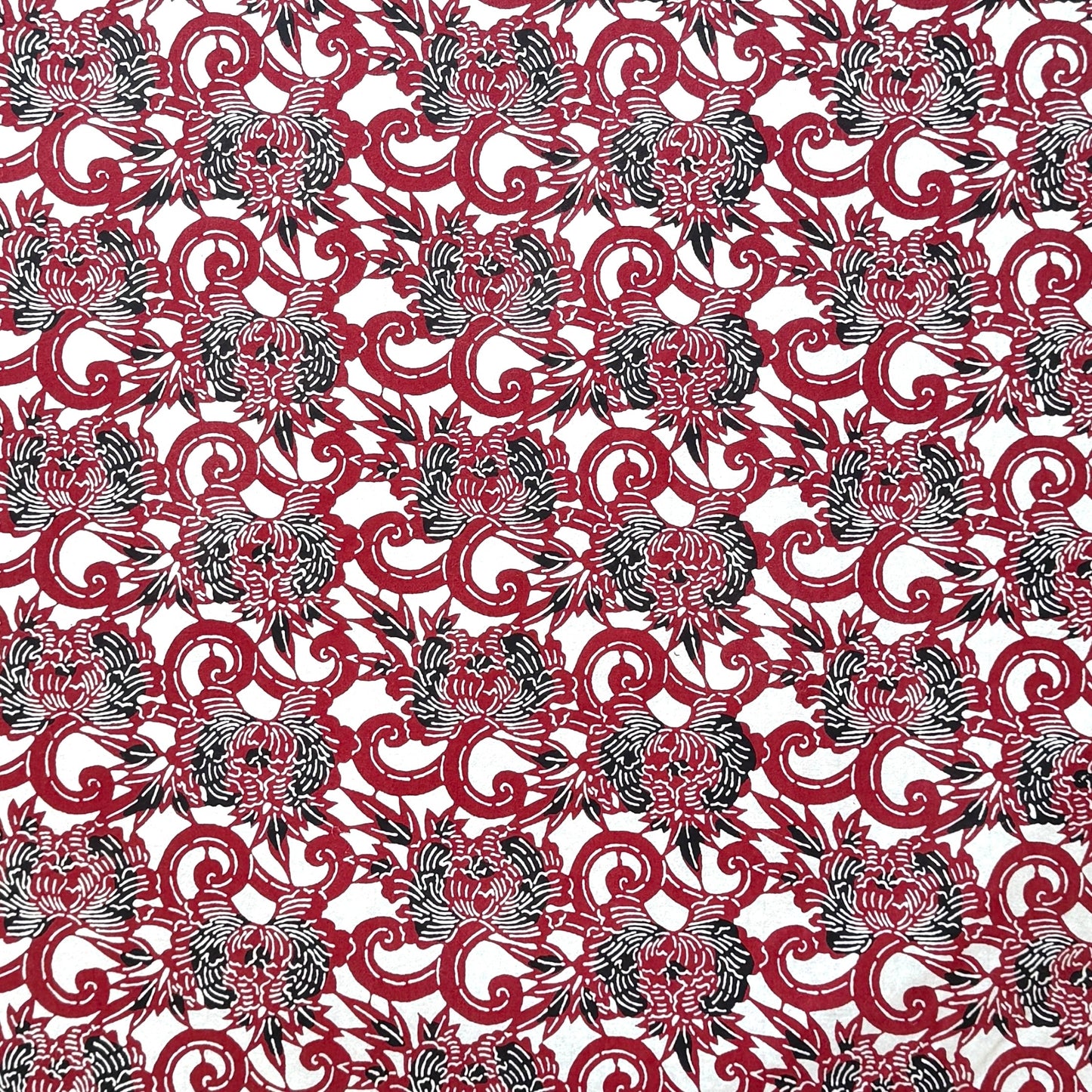 Pattern of berry red peonies (botan) on a sheet of Japanese katazome paper