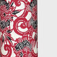 Pattern of berry red peonies (botan) on a sheet of Japanese katazome paper. Close up