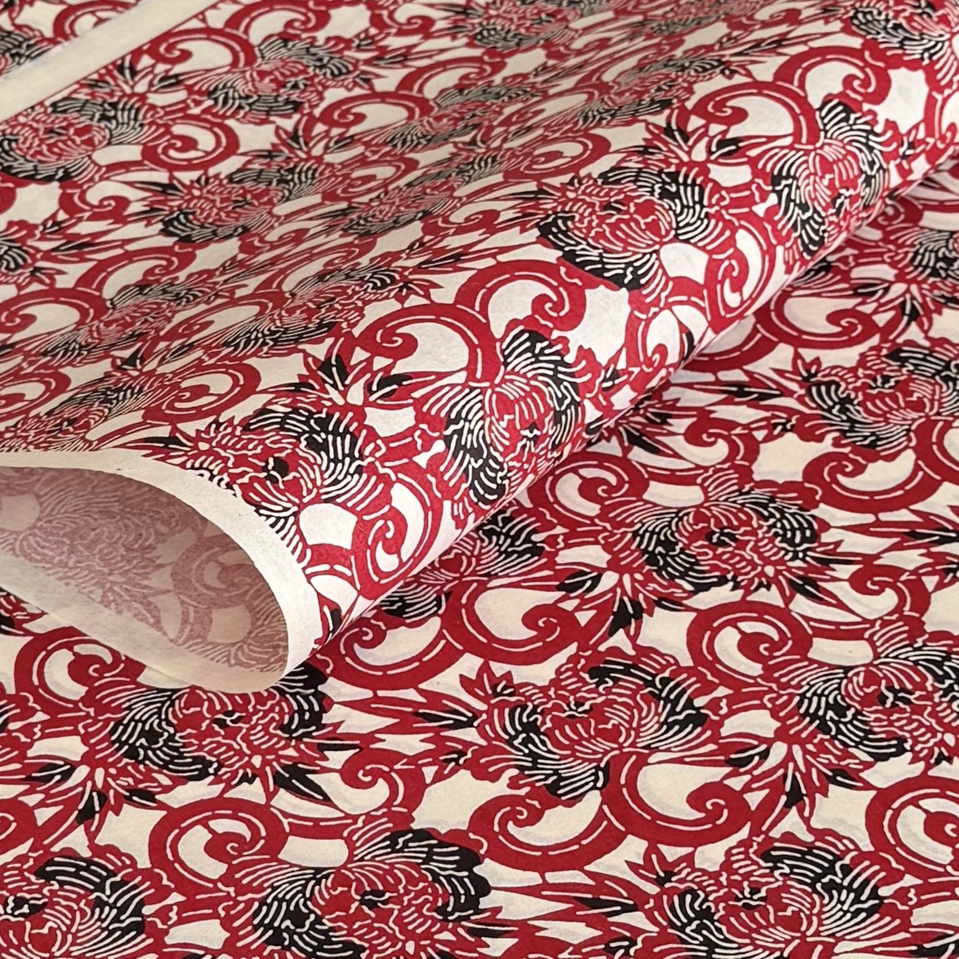 Pattern of berry red peonies (botan) on a sheet of Japanese katazome paper
