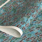 A Japanese pattern of hillside villages.  Katazome stencil-dyed paper from Japan in colours of blue, green, brown and white