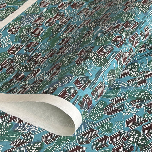 A Japanese pattern of hillside villages.  Katazome stencil-dyed paper from Japan in colours of blue, green, brown and white