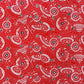 a sheet of Japanese katazome paper with a pattern of red and white umbrellas 