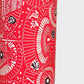 a sheet of Japanese katazome paper with a pattern of red and white umbrellas. Close up 
