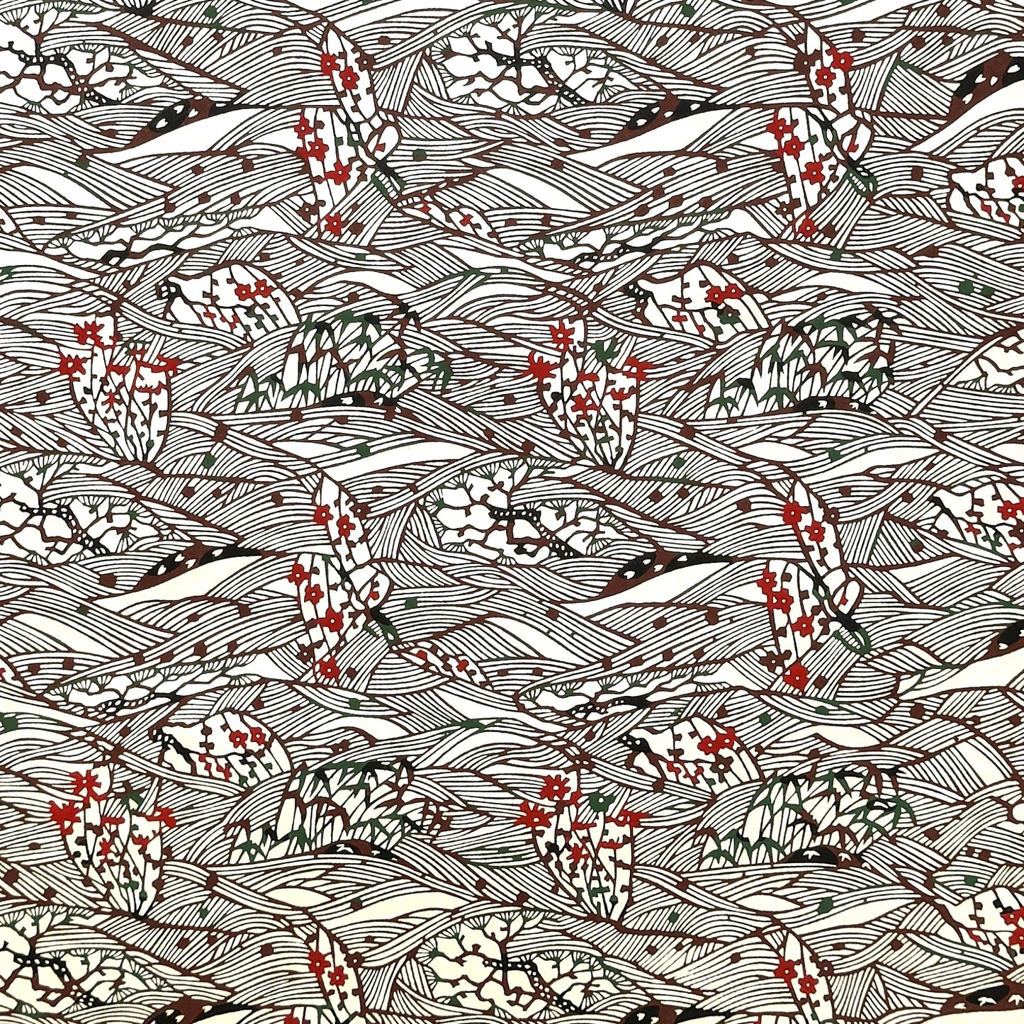 A botanical pattern with bamboo (take) and flowers in brown, red and green. A sheet of katazome paper.