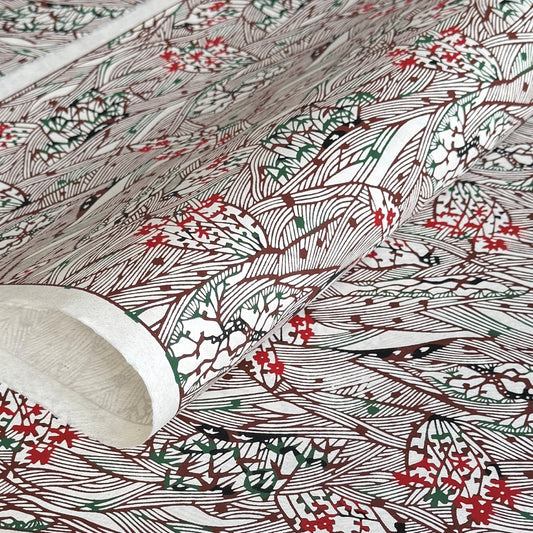 A botanical pattern with bamboo (take) and flowers in brown, red and green. A sheet of katazome paper.