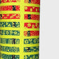 Floral patterned rectangles on vibrant lime green. A sheet of katazome paper. close up