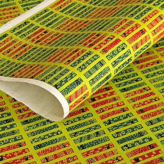 Floral patterned rectangles on vibrant lime green. A sheet of katazome paper