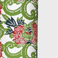 a sheet of katazome paper with a pattern of peonies (botan) in a rich red amongst green foliage. close up