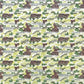 a sheet of katazome paper with a pattern of a hillside village in lime green, green and brown