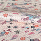 Pattern with cranes and flowers in soft pink, purple, blue and orange.  A sheet of katazome paper