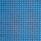 a sheet of Japanese katazome shi paper with a delicate tile repeat pattern on a bright blue backdrop