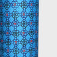a sheet of Japanese katazome shi paper with a delicate tile repeat pattern on a bright blue backdrop. Close up