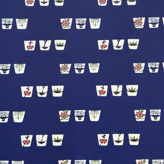 Japanese katazome-shi paper in blue with small Japanese Mon motifs