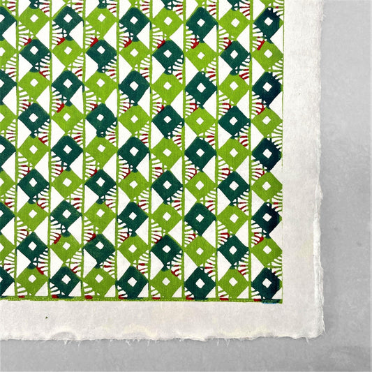 japanese stencil-dyed handmade paper with small scale diamond repeat pattern in two-tone green