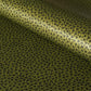 A sheet of Japanese lacquered yuzen paper in dark olive green with little cherry blossom flowers in black