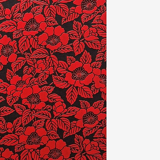 A sheet of Japanese lacquered yuzen paper in black with a red camellia flower pattern