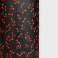 a sheet of Japanese lacquered yuzen paper with black background and little red dragonflies