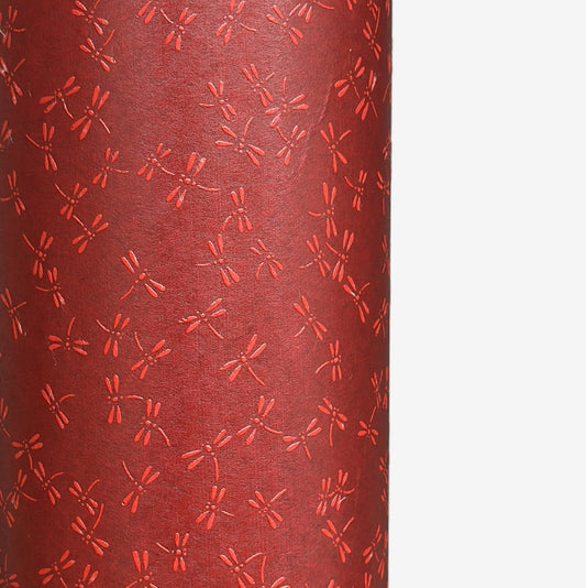 a sheet of Japanese lacquered yuzen paper in bright red background and little red dragonflies