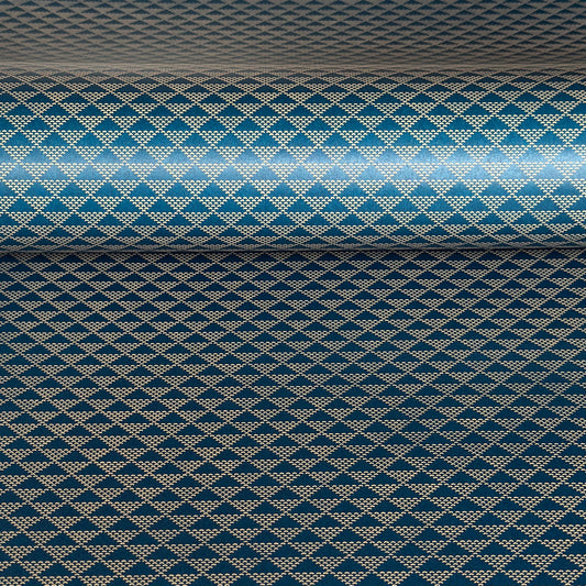 A sheet of Japanese lacquered yuzen paper in deep teal with a repeat small triangle geometric pattern in cream