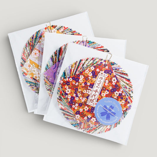 a pack of 40 sheets of origami squares made from the finest yuzen chiyogami patterned paper