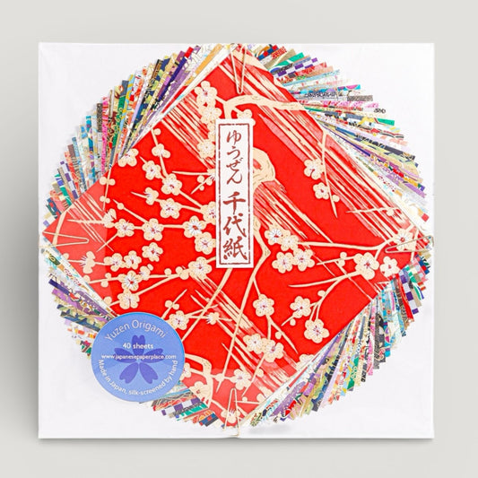 a pack of 40 large sheets of origami squares made from the finest yuzen chiyogami patterned paper