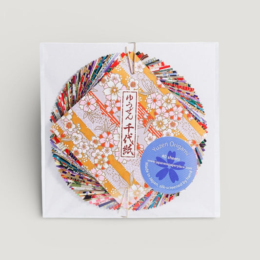 a pack of 40 small sheets of origami squares made from the finest yuzen chiyogami patterned paper